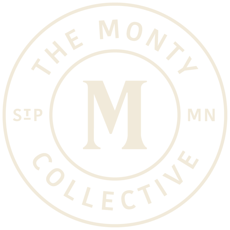 The Monty Collective cream badge logo